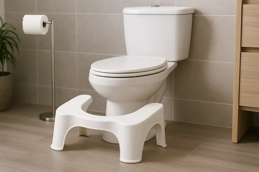 A modern bathroom featuring a toilet stool for improved bowel movements.